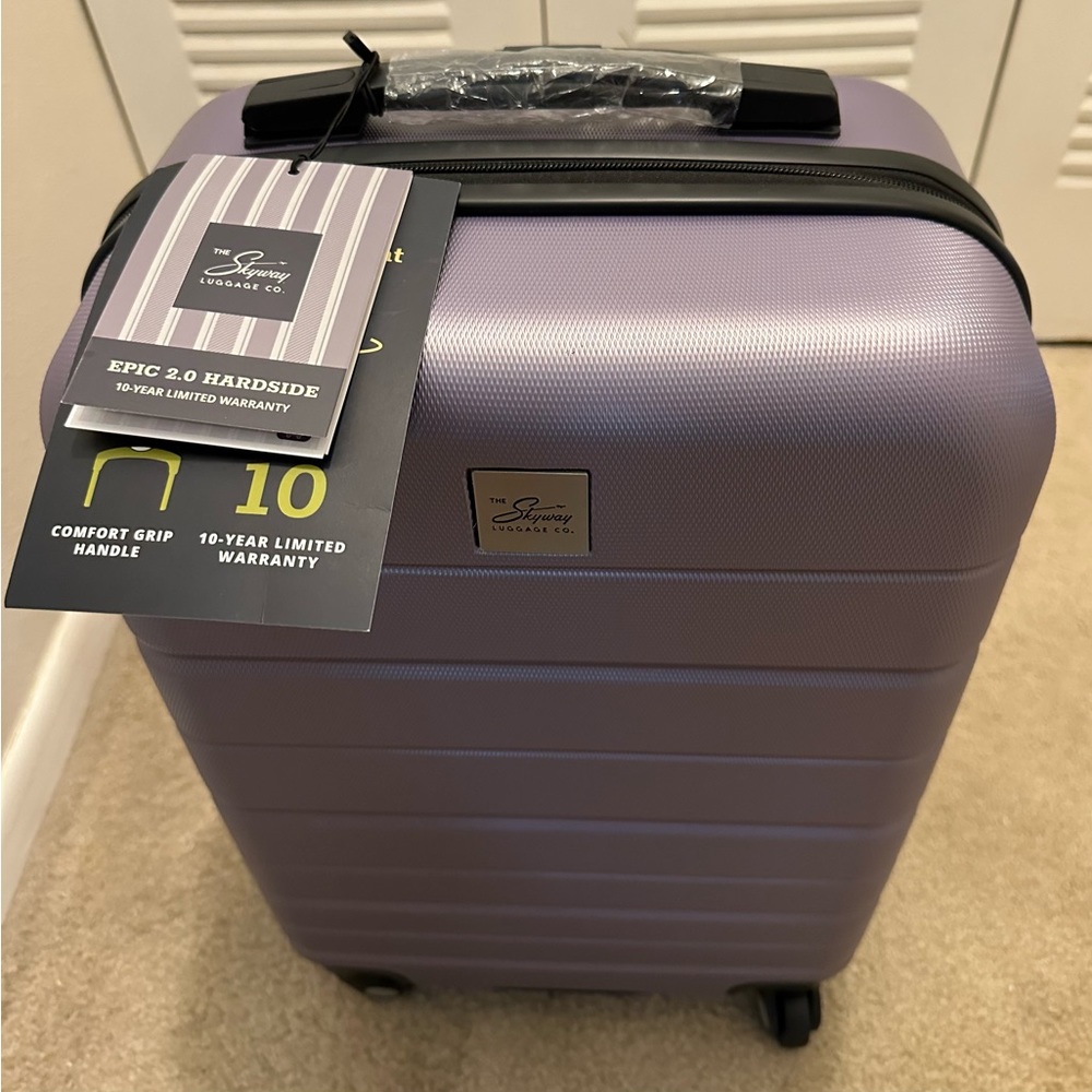 Carry on Skyway Epic 2.0 Lilac  New 10 yr warranty.